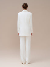 Tailored Double-Breasted Blazer with Peak Lapels and Structured Longline Silhouette